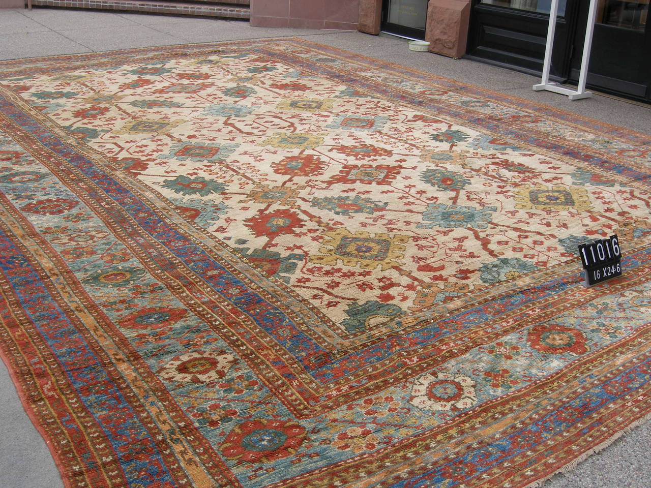 Classic antique Turkish Ushak. This rug was woven in Ushak district of Central Anatolia, circa 1875. This Ushak is a beautiful example of the Ushak carpets because of the repeat design and large oversize format. The condition is excellent with full