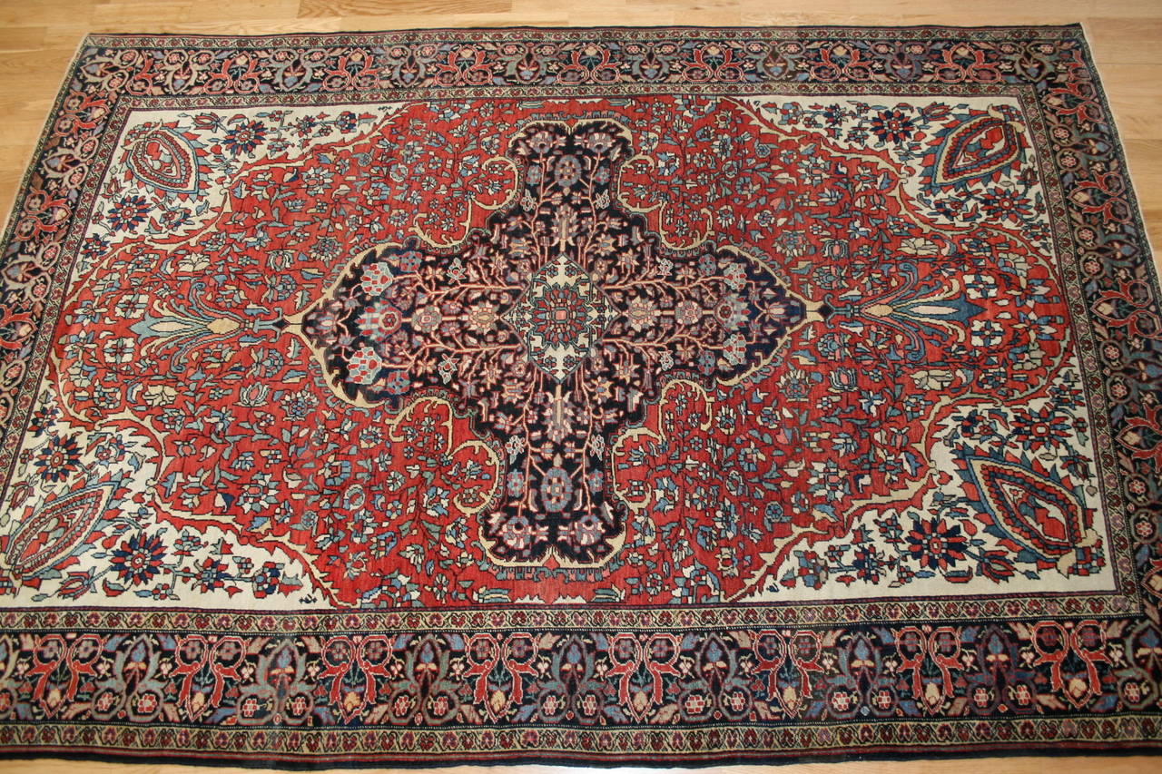 This carpet was woven in the Arak district of central Persia, circa 1890-1905. Faraghans were considered the finest quality rug that money could buy during this period. The highly saturated vegetal and insect dyes produce an exceptionally rich