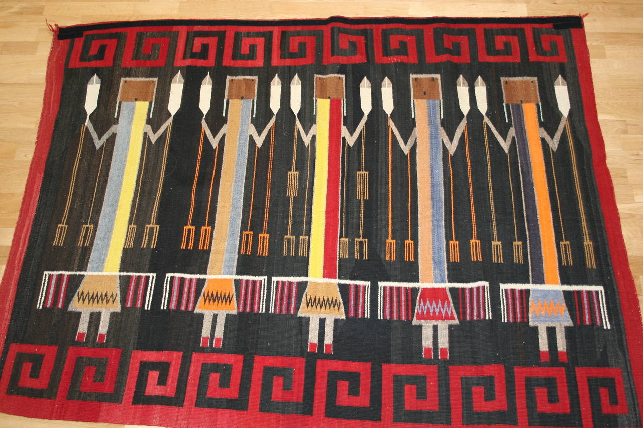 Finely woven pictorial Navajo rug. This weaving is a Classic example of a Native American ceremonial weaving. The term 