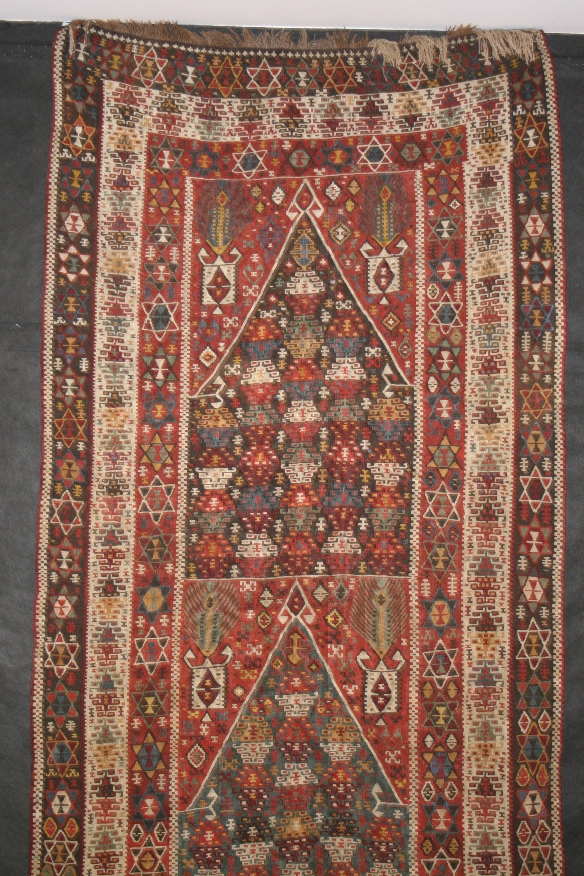 This is a very unusual example of a wedding Kilim (flat-weave), woven in eastern Turkey during the end of the 19th century Ottoman period. The very best, highest quality flat woven rugs of this period were woven in this region of Asia Minor. This