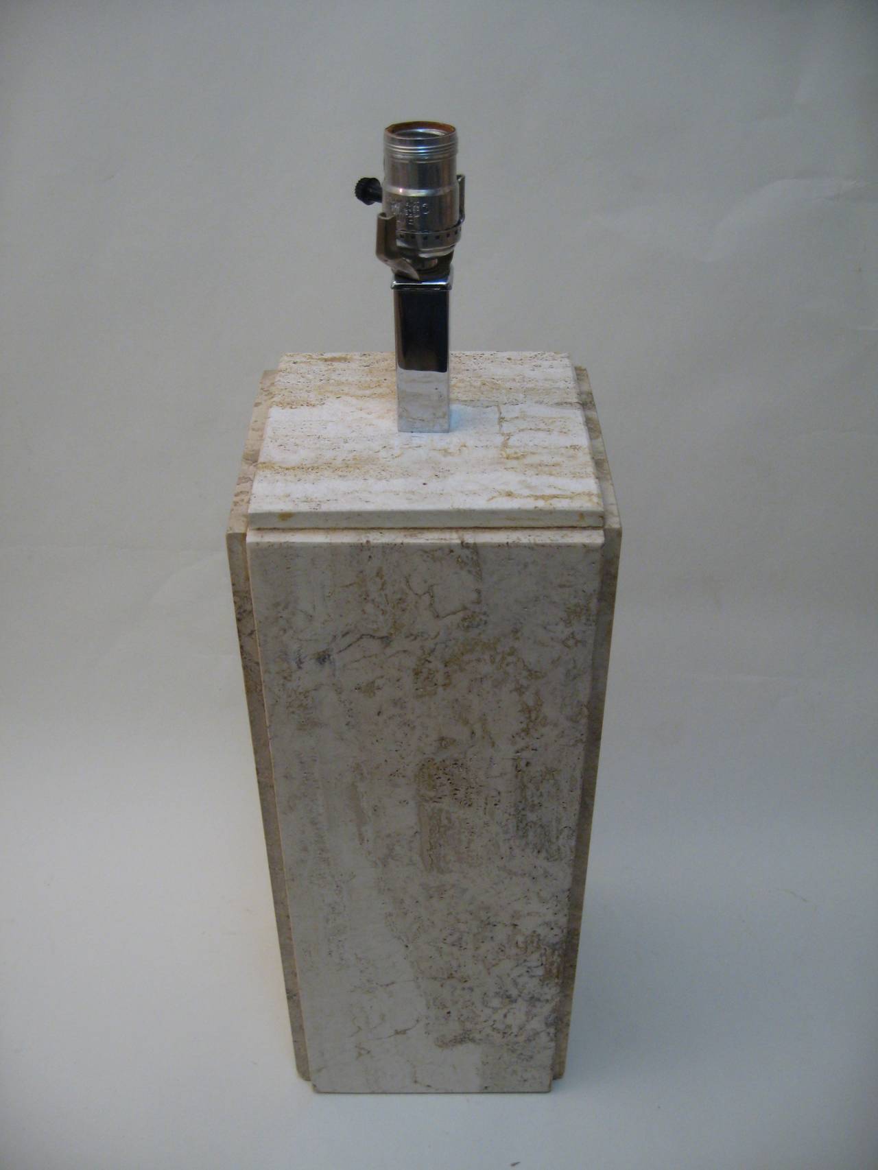 Architectural Travertine lamps for Raymor.  Travertine slab construction.  Very good, original working condition.  Signed with blue label on socket. 23.5