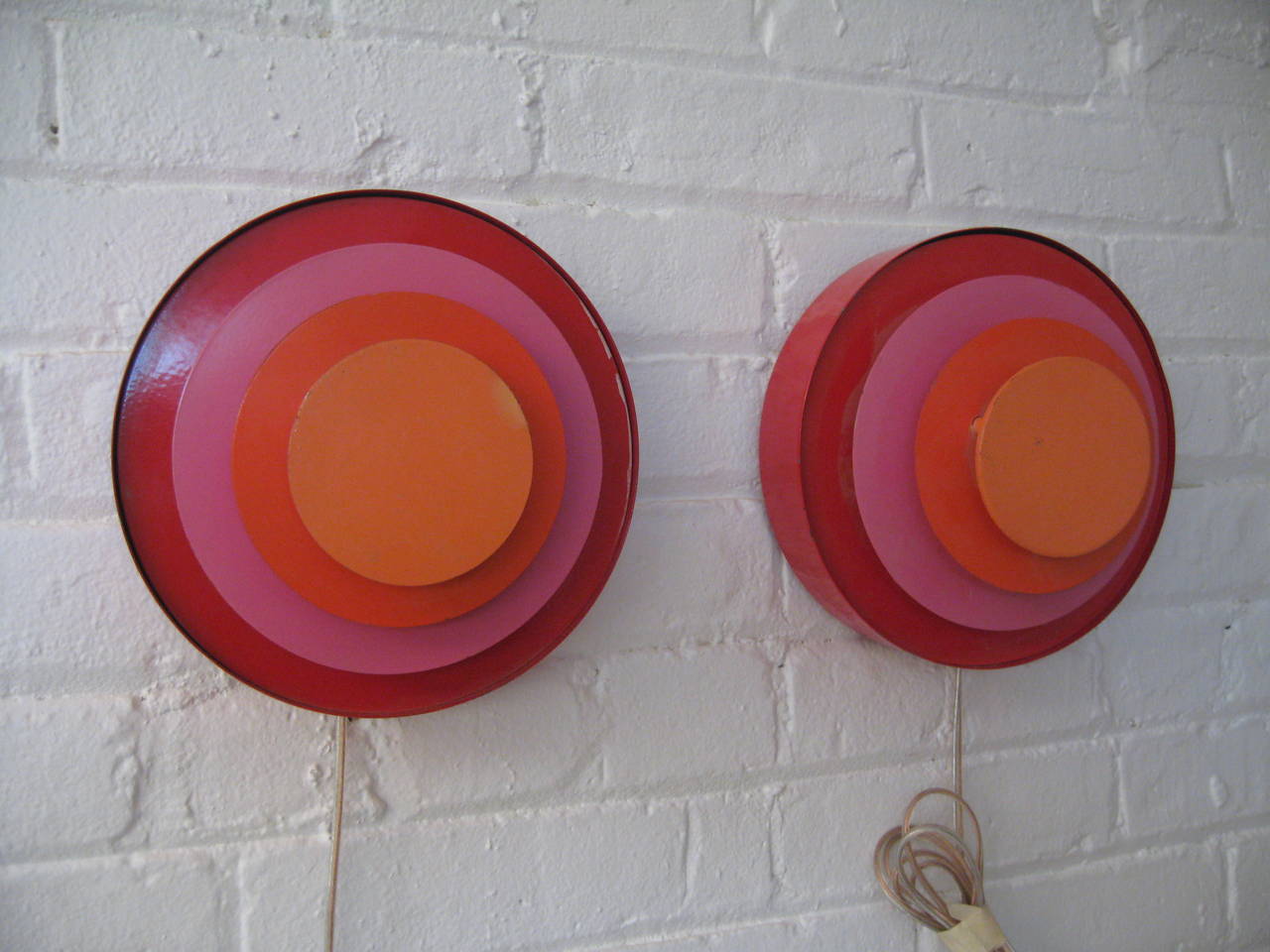 Pair of 1960s Pop-Art Verner Panton-inspired wall sconces. Rewired and in working condition, requires 60W-75W-max standard bulb. Unsigned.  Colorful and fun.  Great mood lighting.