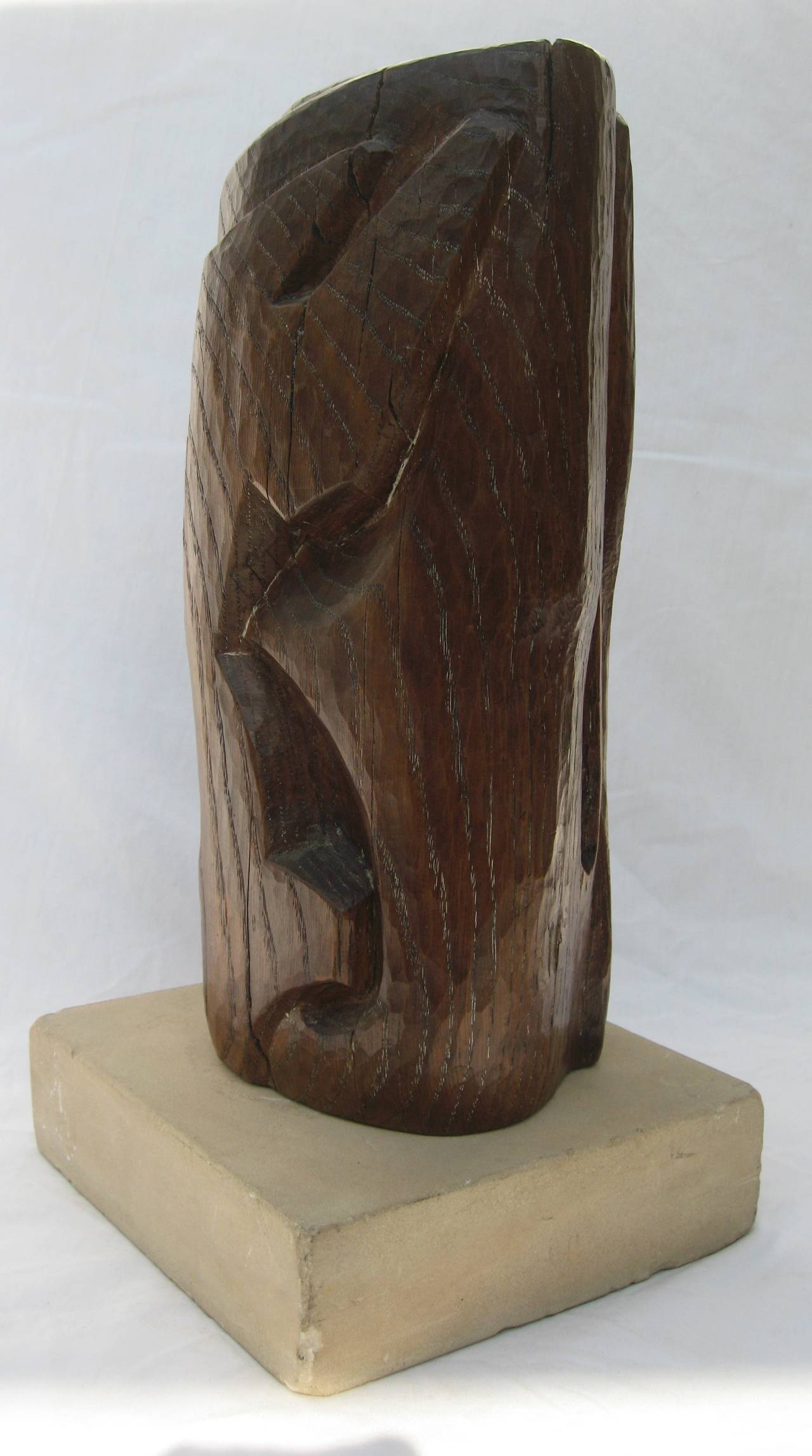 Beautiful modern sculpture by Belgian artist Willy Anthoons (1911-1983). The intertwined figures are composed of carved limed oak resting on a limestone base. Carved signature on base of sculpture, Willy Anthoons 1950. The overall height is 14.25