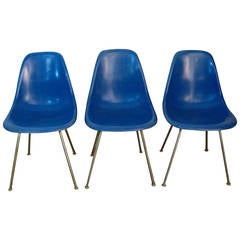 Three Eames Herman Miller Ultramarine Shell Chairs