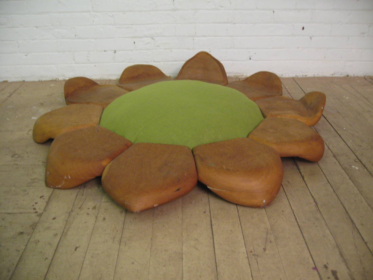 Truly the best way to practice your meditation in seated Lotus position.  The center cushion is upholstered in new chartreuse fabric.  The 10 lotus flower petals are made of thick pine and surround the ample sized cushion.  Give your meditation that