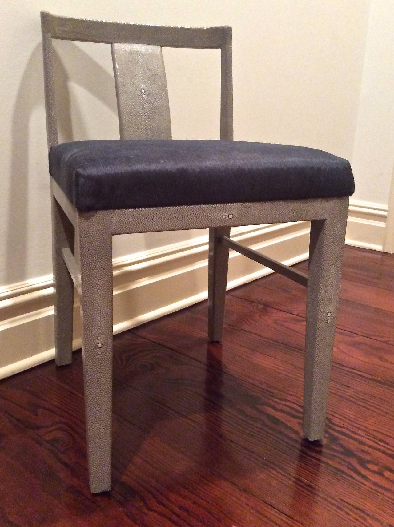Set of eight shagreen wrapped chairs with steel blue/grey pony hair seats.