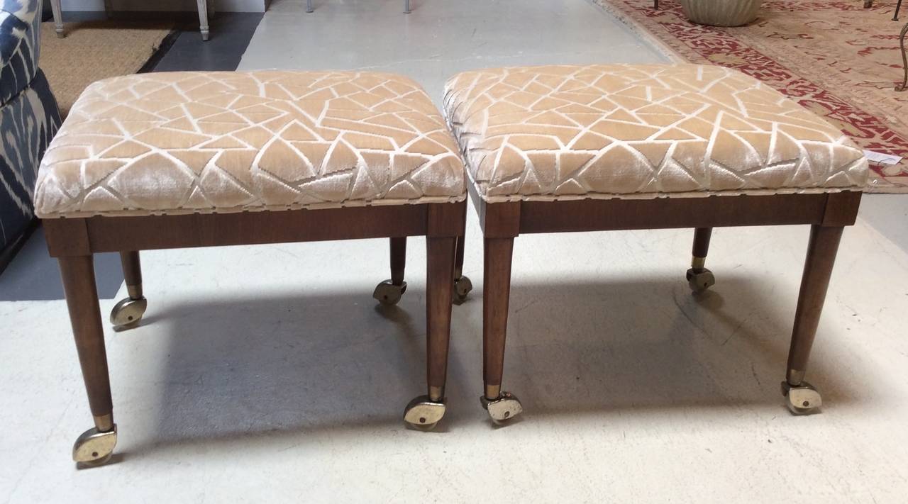 Pair of Footstools or Ottomans on brass castors (Removable)  newly upholstered in a abstract cut velvet fabric by Nobilis.