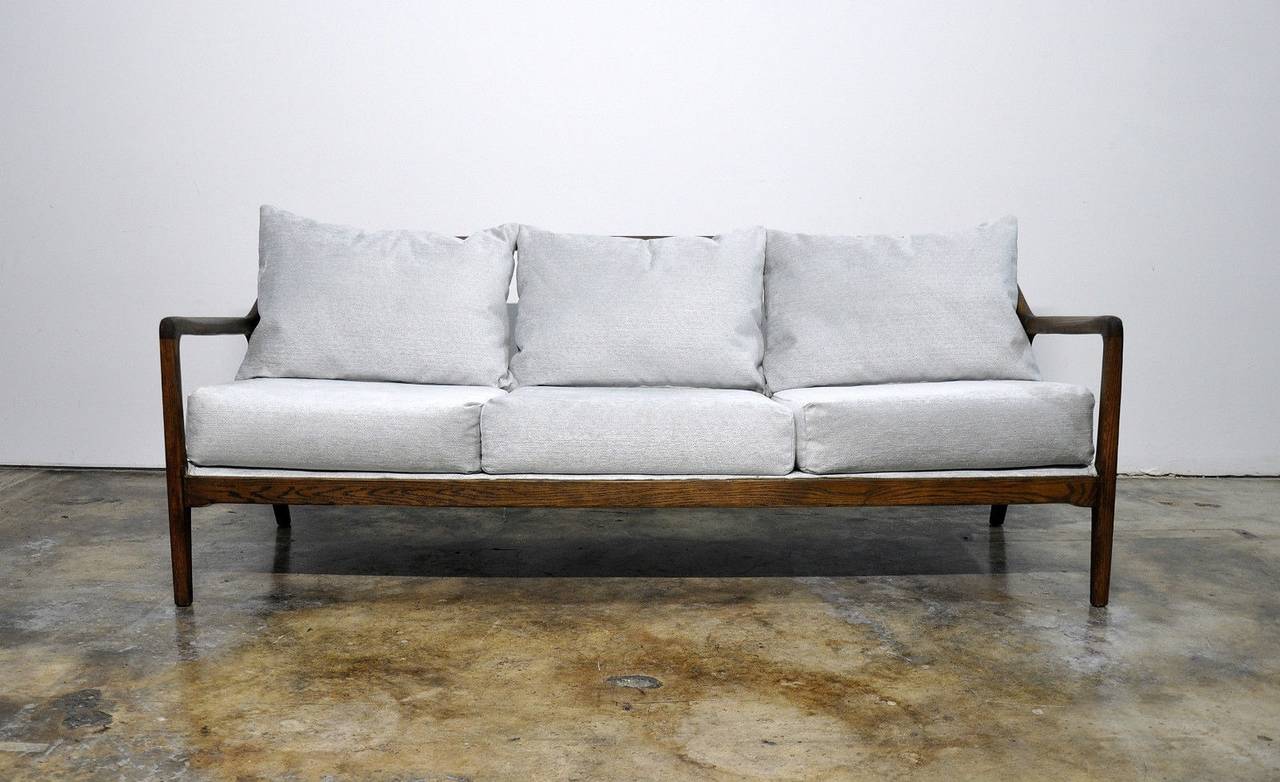 Amazing, Mid Century Modern sofa designed by Jack Van der Molen for Jamestown Lounge Co. for their Americana Casual collection, dating from the 50s. 
Reminiscent of designs by Ib Kofod Larsen for Selig. Spindle back, curved arms, newly upholstered