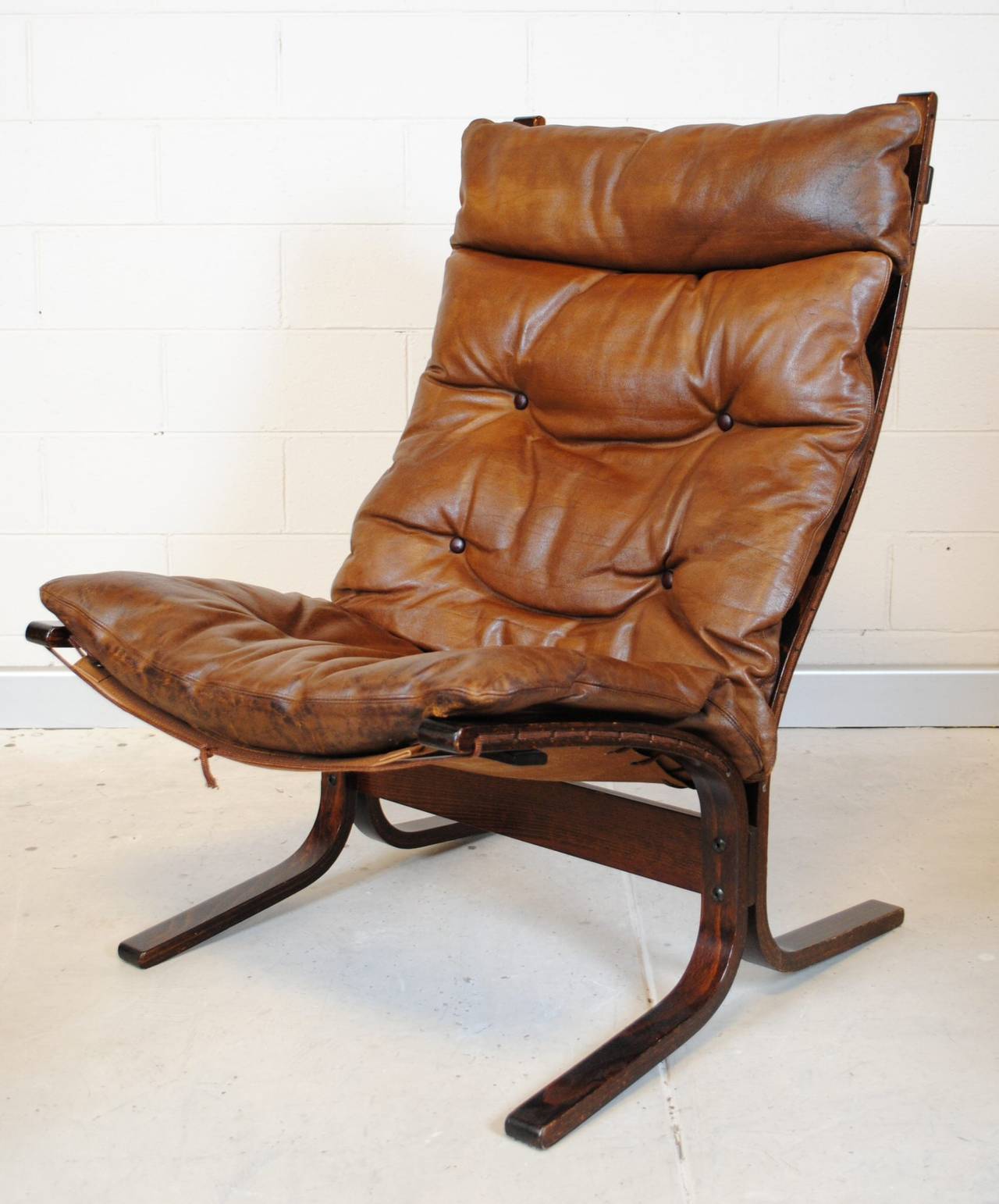 Norwegian Rosewood Framed Leather Siesta Chair and Stool For Sale