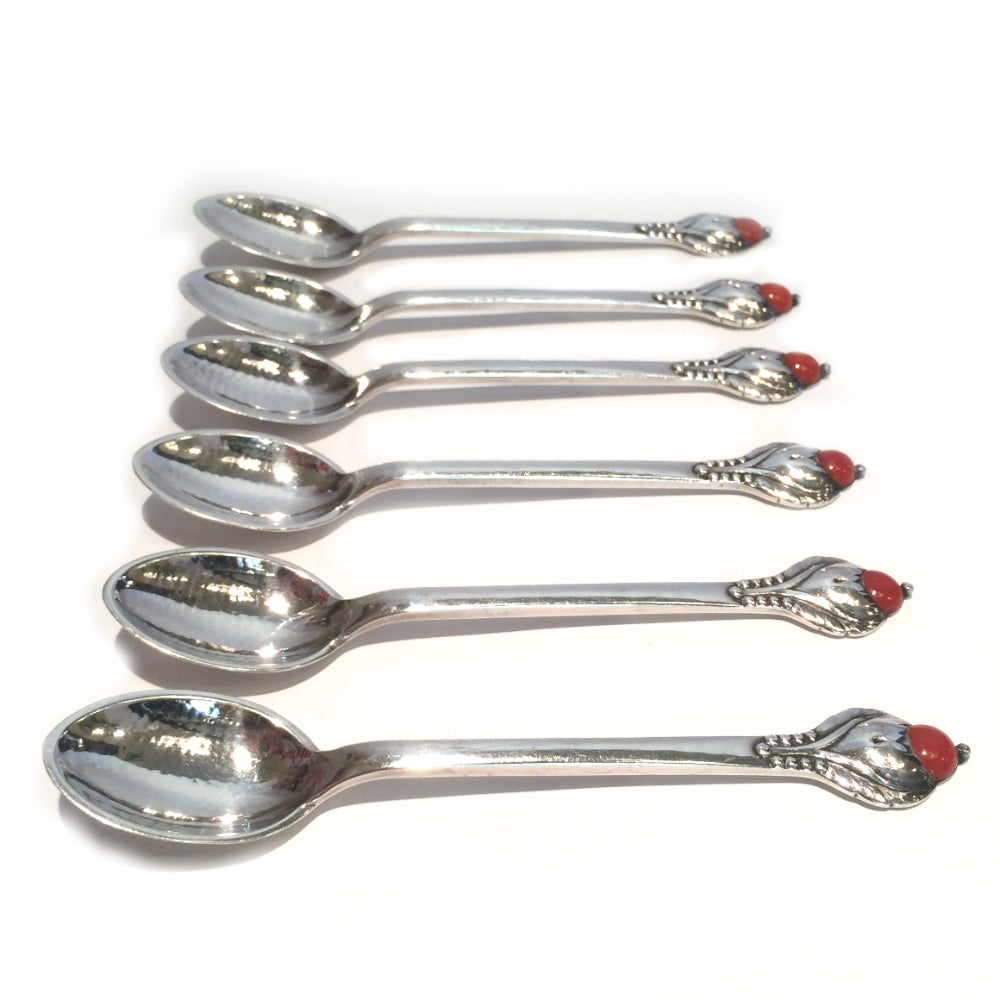 Set of six, 830 Danish silver tea spoons with cabochon coral beads by legendary silversmith Evald Nielsen. This set was produced in 1929 in the “Number 3″ pattern. Evald Nielsen was considered Georg Jensen’s greatest rival and was famed for his work