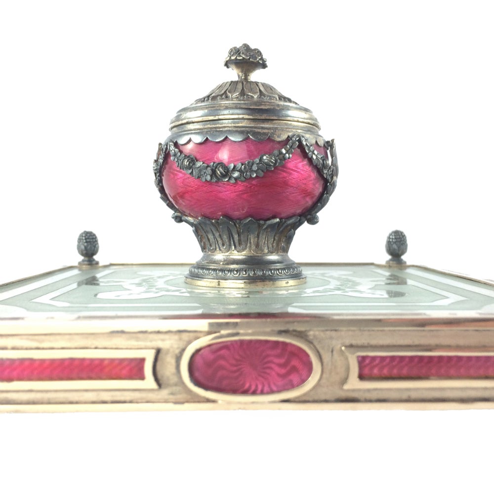 A 20th century guilloché enamel and gilt silver inkstand by Dreyfous. This delicate inkwell features exquisite craftsmanship, with each side of the Stand featuring three guilloche´ enamel panels, not to mention the superbly crafted enamel well, and