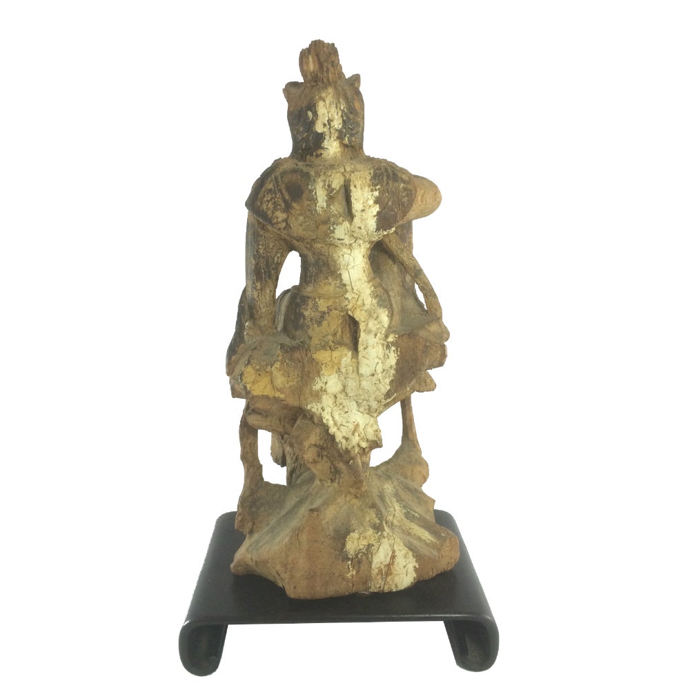 It is believed that this detailed hand-carved timber statue of the Chinese Goddess of mercy Guanyin dates to the transitional period between the end of the Yuan Dynasty and the start of the Ming Dynasty. It is however possible that this is a later