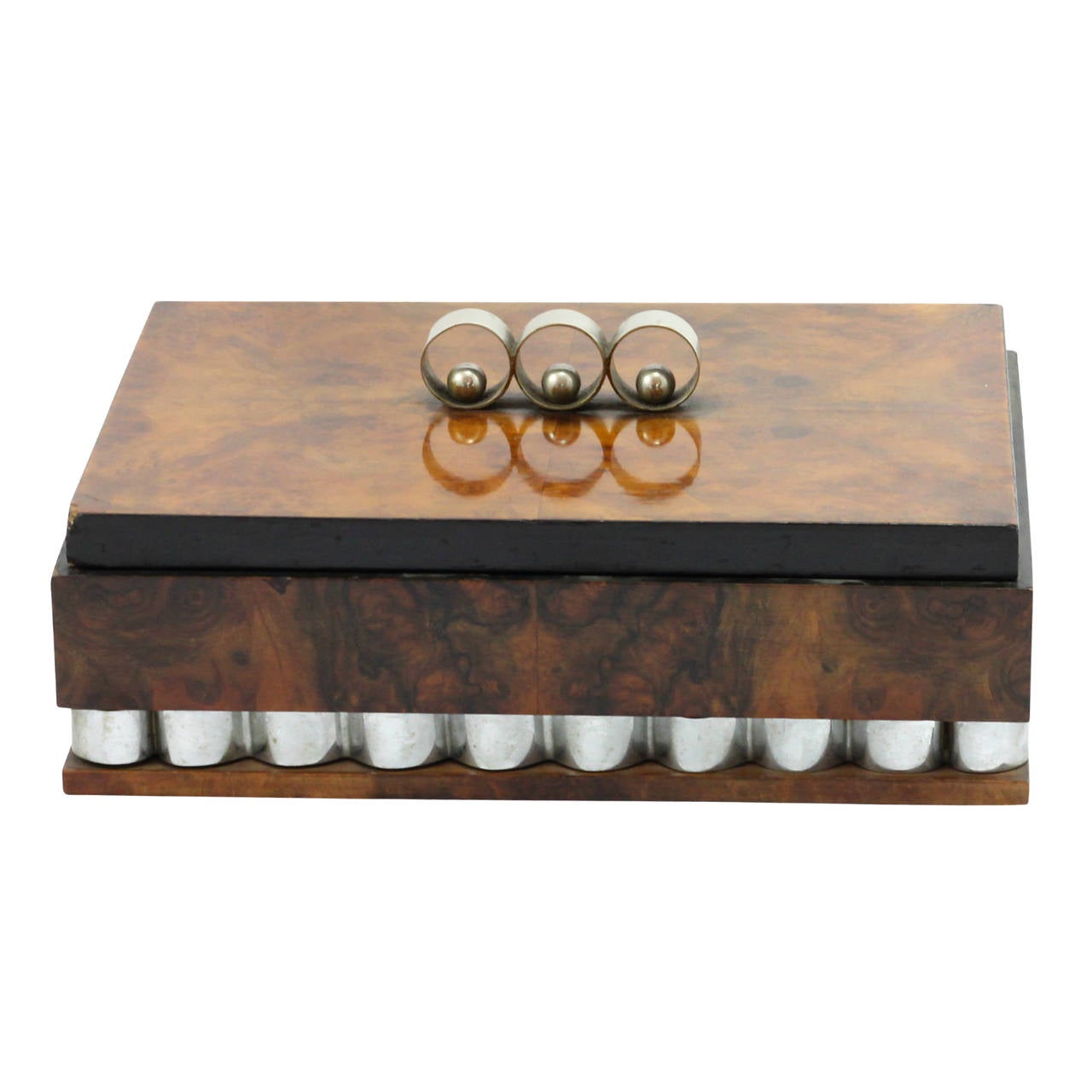An Art Deco walnut veneered jewelry box. This piece has a mirrored lid and a timber lining.