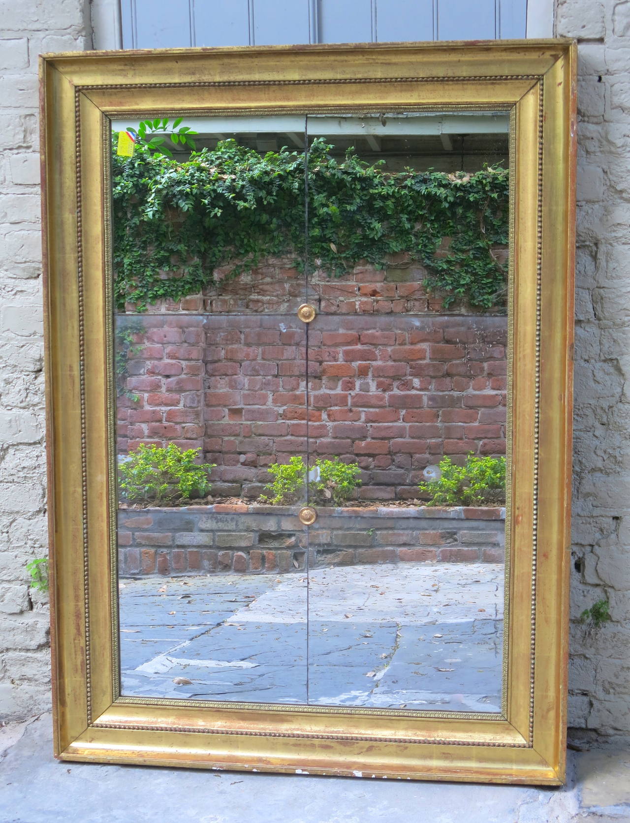 French Louis XVI Mirror in Six Sections of Original Mercury Glass, Wide Gilded Frame, and Original Wood Panel Back.