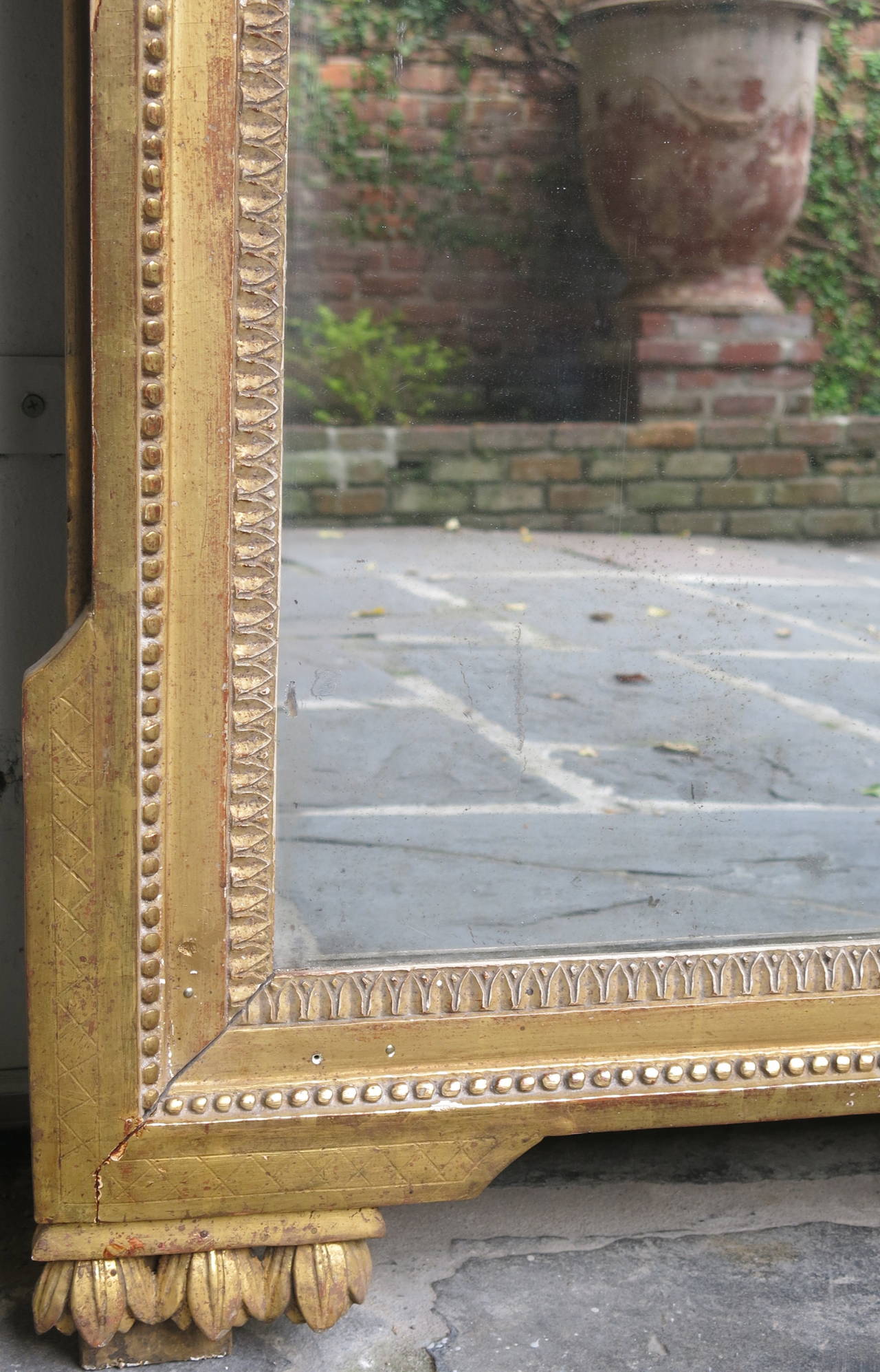 Carved 18th Century French Gilded Louis XVI Mirror For Sale