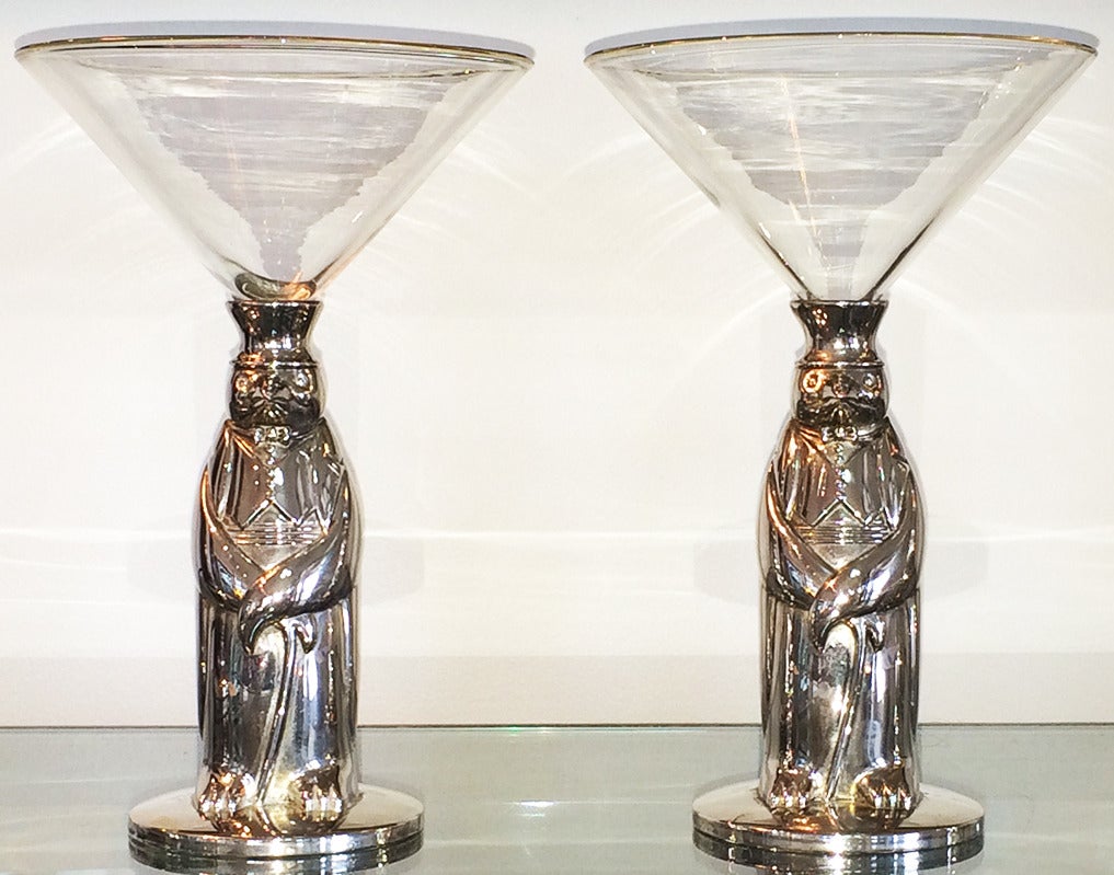 Rare Art Deco Towle Penguin cocktail shaker with two of the martini glasses with Penguin bases.  This is a lovely set in excellent condition with only a slight dimple to the base of the shaker.  The martini/cocktail glasses are in perfect condition.
