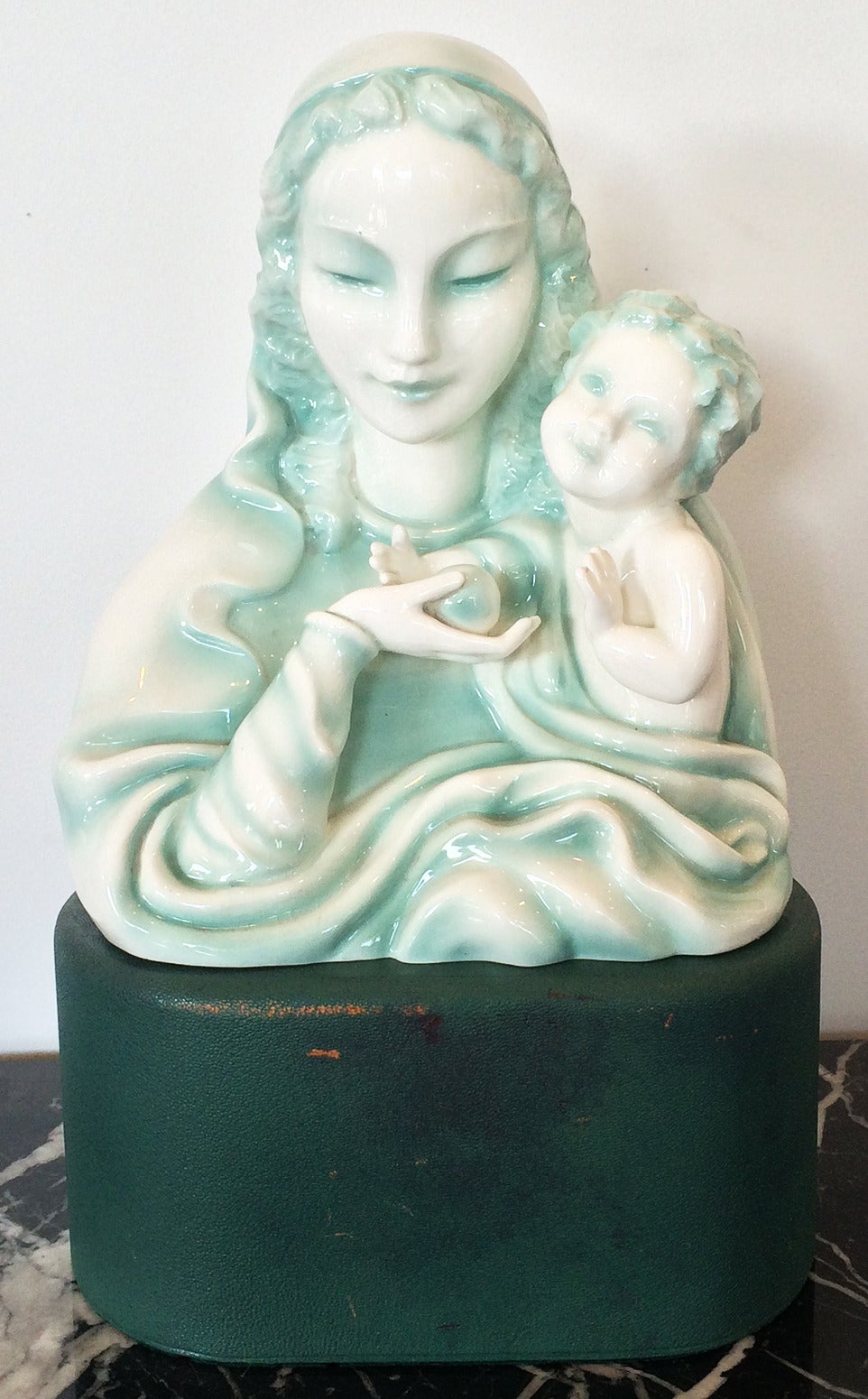 Statue of Mother and Child, by Goldscheider, Austria. A.. A truly wonderful image of mother, offering an apple to the young child. In soft subtle monotone of pale blue/green on white, seated on a magnificent base, obviously made at the same period,