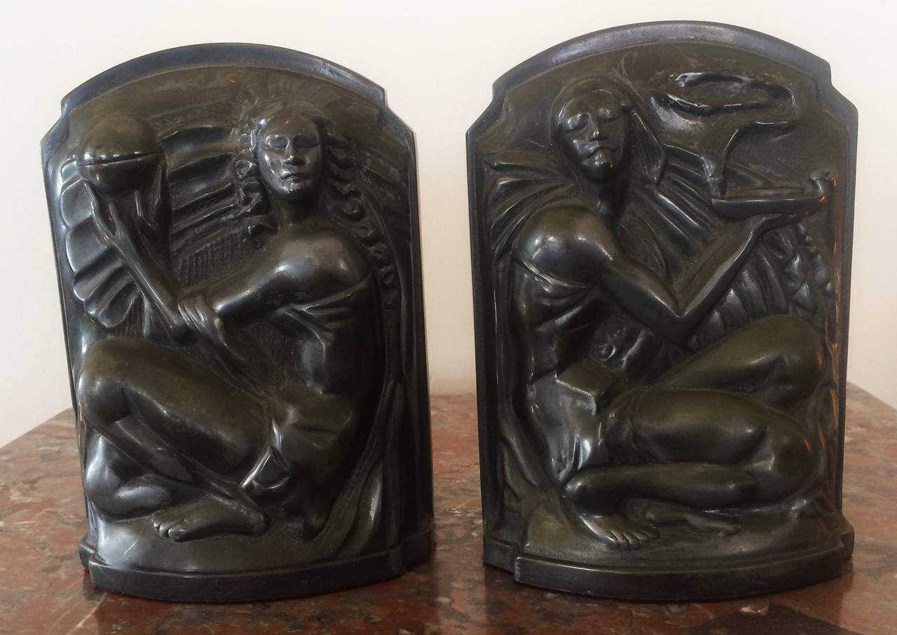 These wonderful Bookends, were originally bronze elevator adornments of the “Farmer’s Trust” elevators, this building now 20 exchange place, formerly the City Bank-Farmers Trust Building commenced building in 1931. These were salvaged at some time