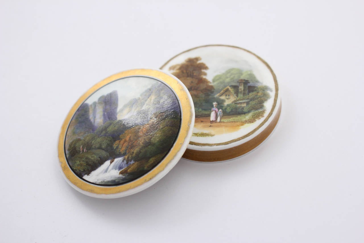Very rare Rockingham snuff box, of simple circular form with porcelain screw thread, superbly painted to both sides by William Willis Bailey with figures in Romantic landscapes, the top with figures by a waterfall, the base with a woman and child by
