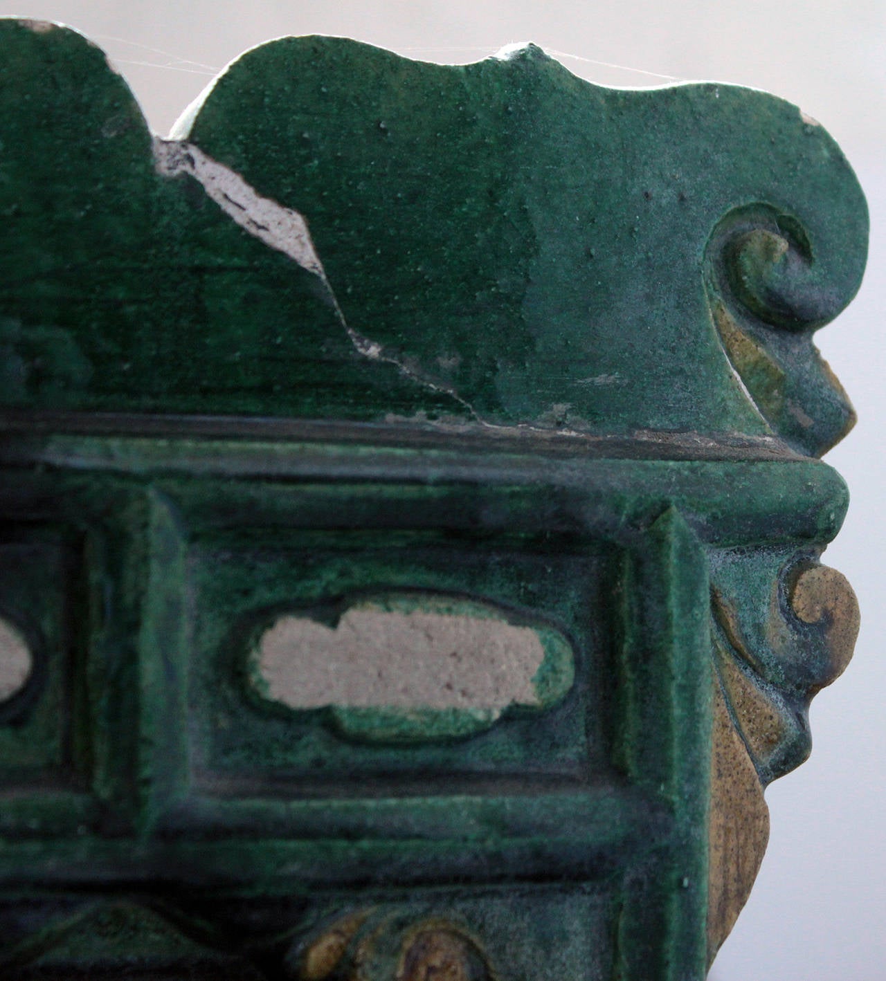Massive Chinese pottery temple model, with realistic modelling of walls and roof features, glazed in a green and ochre glaze.      
Ming Dynasty, 15th-16th century     

Provenance: Australian collection, Melbourne, purchased in the 1980's.   
