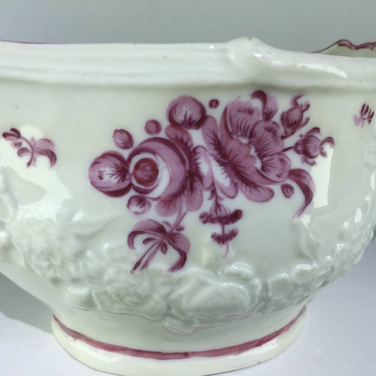 Porcelain Bristol Sauceboat, Moulded Swags and Painted Puce Flowers, circa 1775 For Sale