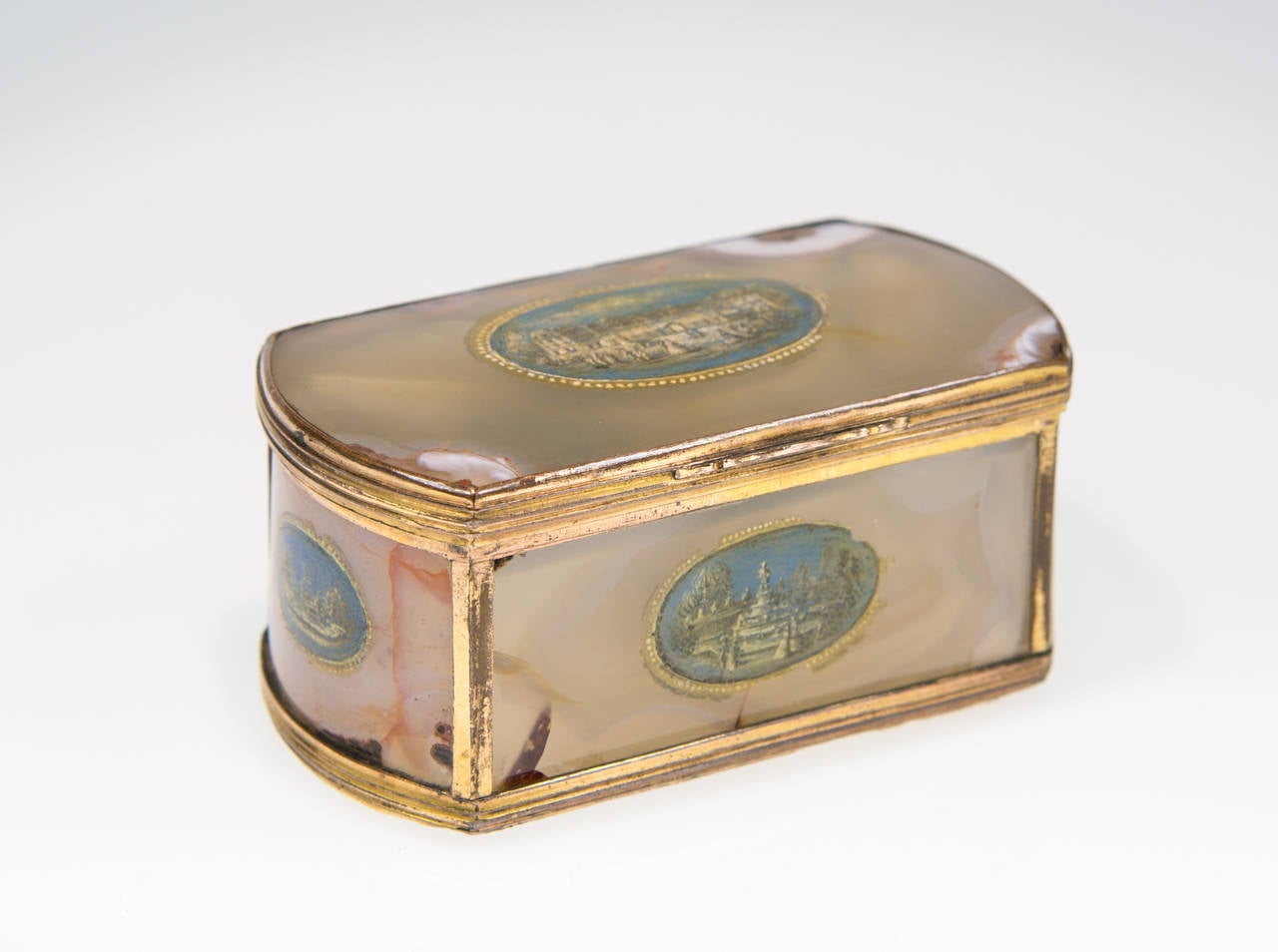 Agate box, made from carefully selected agate slices with shaped sides set into gilt copper frames, each panel with a central scene painted in cold colours, the top with a view of people in the courtyard of Versailles, the sides with various views