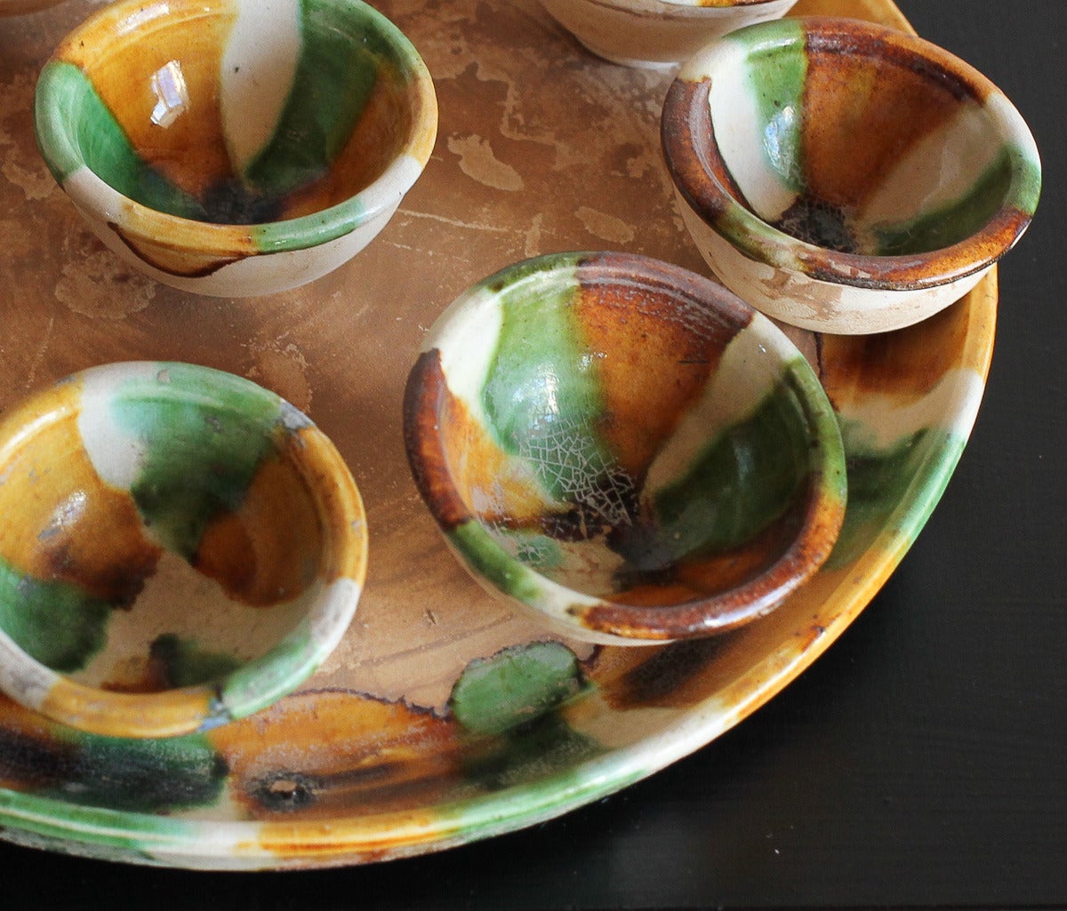 Tang Dynasty Sancai Glaze Set of Ten Wine Cups with Tray, 8th Century AD