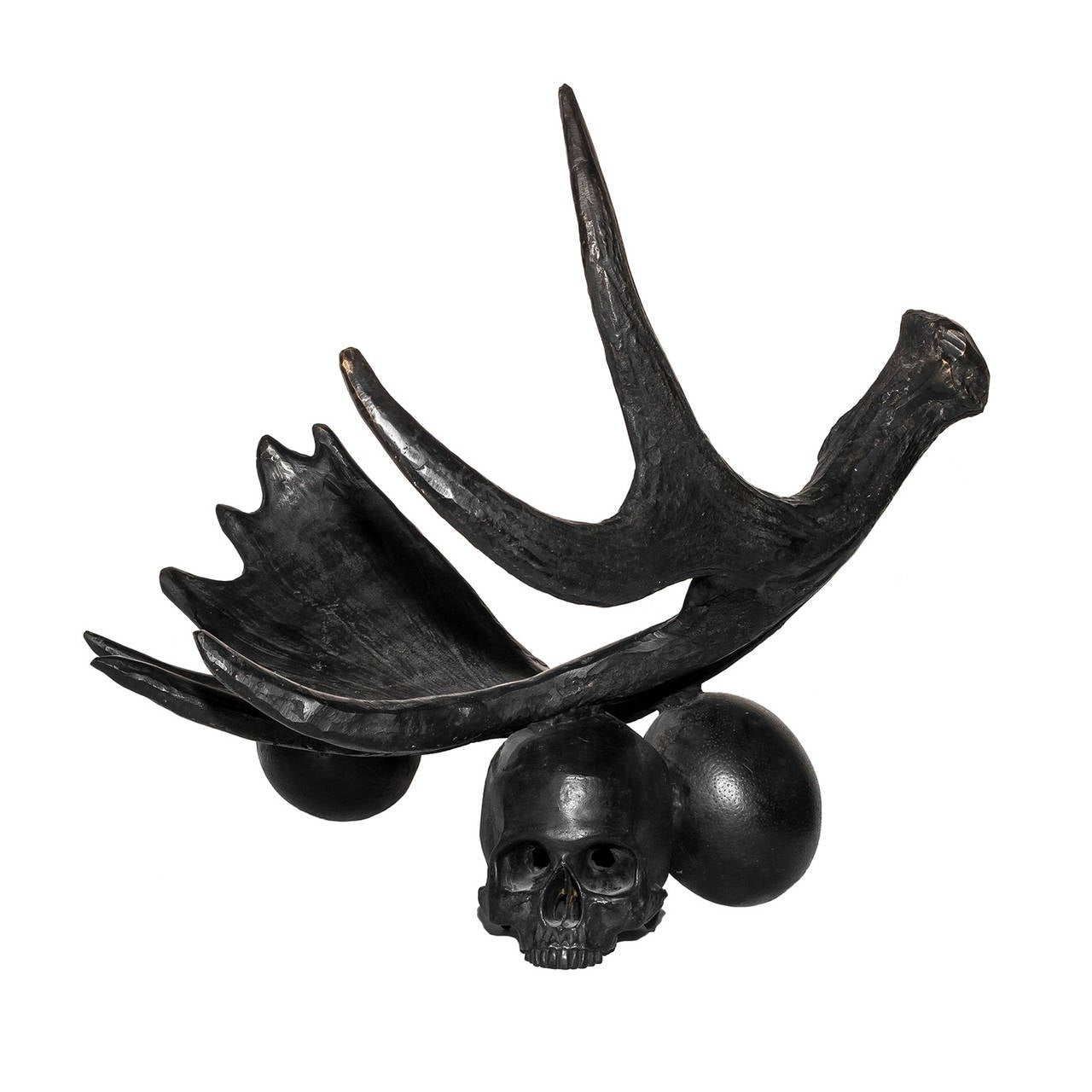 Antler Coupe Sculpture by Rick Owens available from LMD/studio. 

This editioned sculpture from fashion designer Rick Owens features an antler and skull design cast in solid bronze. 