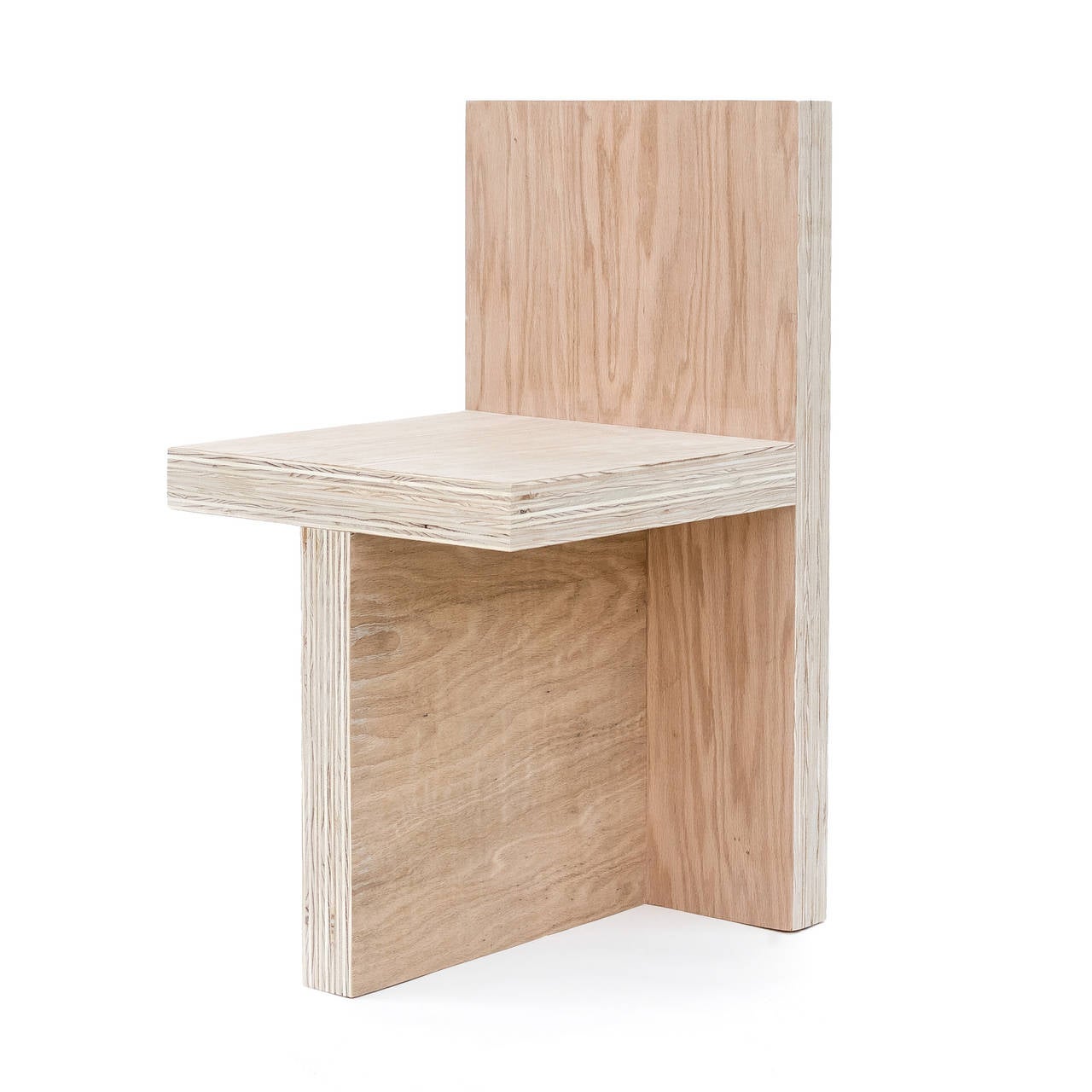 'Monument IV' Natural Plywood Chair by Lukas Machnik available from LMD/studio. 

A few months prior to shooting NBC's American Dream Builders, Lukas Machnik launched monument, a collection of minimal hardwood furniture composed of intersecting