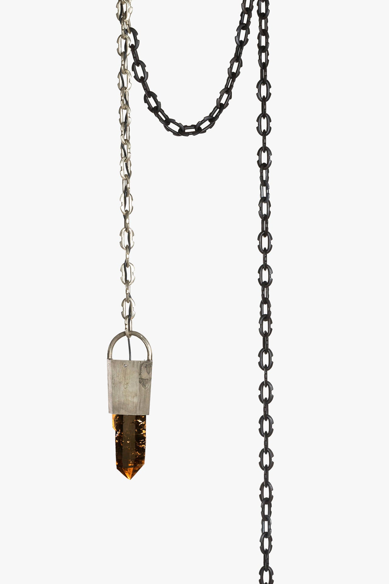 Pendant I by P4h 'Parts of Four Home' available from LMD/studio

Pendant I by P4H (Parts of Four Home) features a citrine quartz crystal compression set into a white bronze pendant, a micro-welded white bronze deco chain and a seamless hand-carved