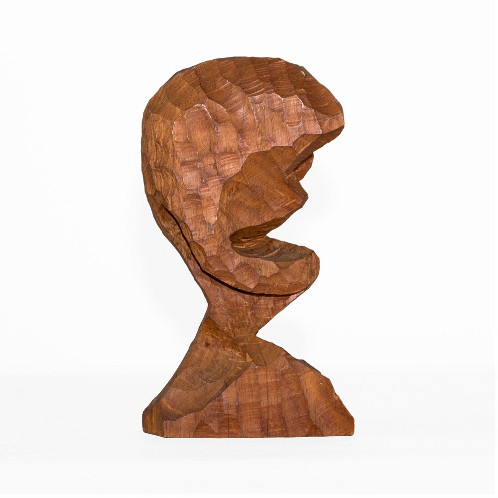 Abstract Hardwood Bust by Outsider Artist available from LMD/studio. 

This abstract figurative sculpture is signed "Rodin J. A. 8 - 69," The artist is unknown.