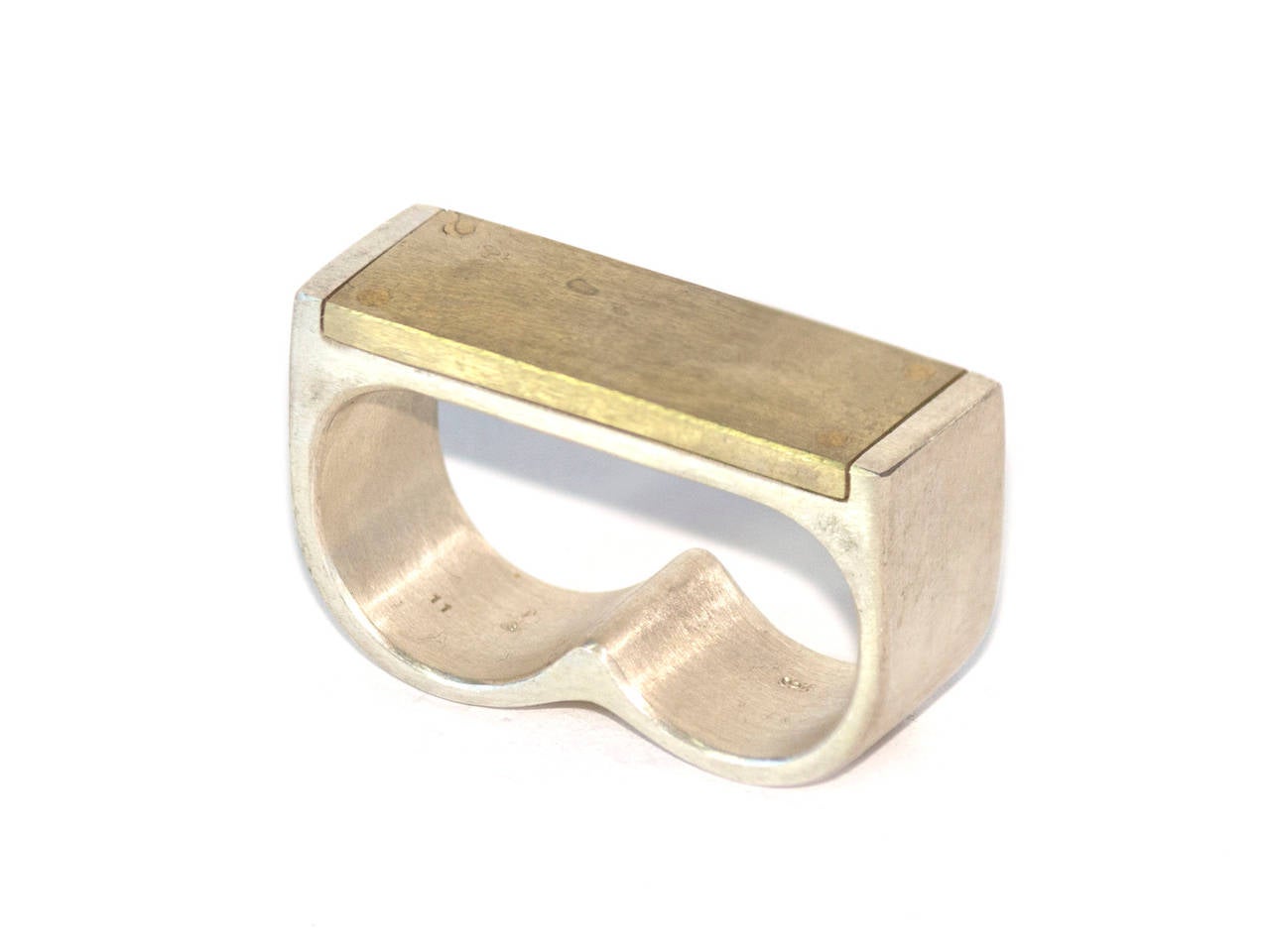 Matte sterling silver and matte brass double finger ring by P/4