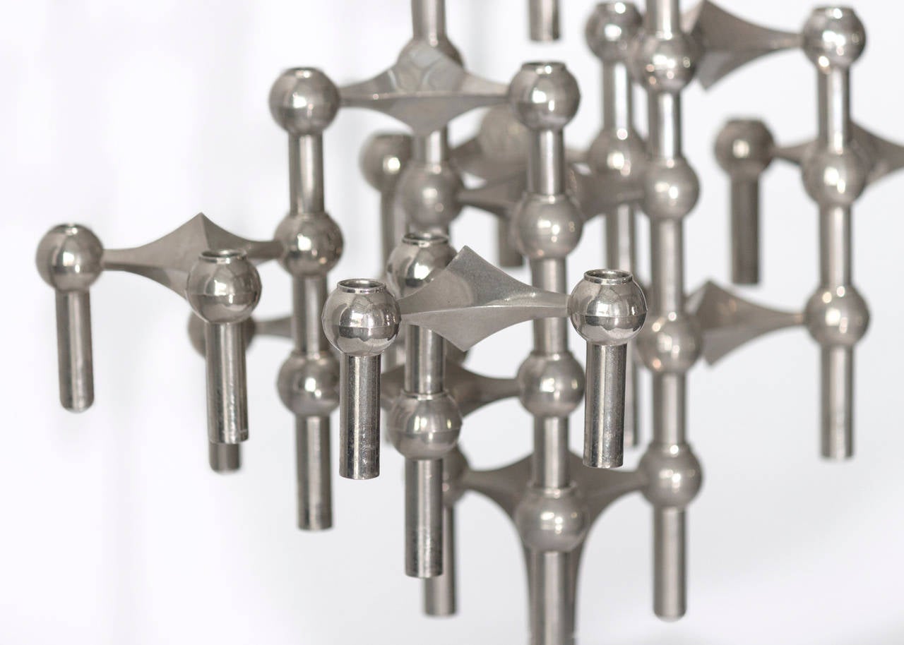 Modular chrome candleholder by Ceasar Stoffi and Fritz Nagel. Manufactured by BMF (Bayerische Metallwaren Fabrik) during the 1960s in West Germany.

This modular candle holder by Caeser Stoffi and Fritz Nagel consists of more than a dozen elements