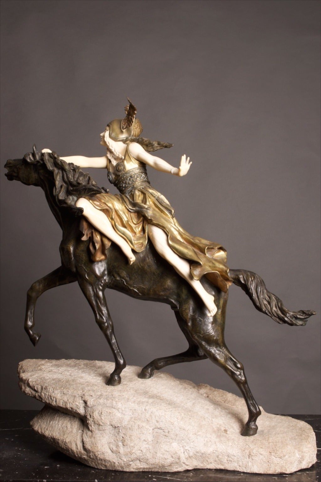 This sculpture is known as ‘Valkyrie’ & also as ‘Towards the Unknown’. Consisting of Bronze, Ormolu & Bone upon a textured stone base. The signature Claire JR Colinet to the base.
Colinet was born in Belgium & studied in France, exhibiting at the