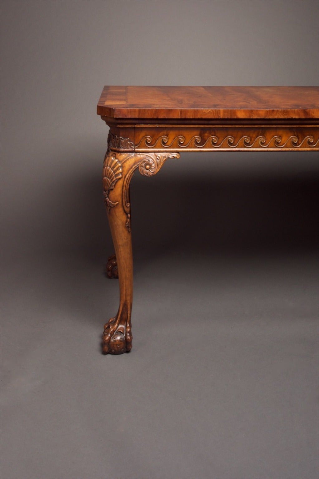 Australian sideboard in cedar and specimen timber inlays, circa 1920s. In the classical Georgian taste, the carving showing native Australian fauna. The piece was made by Sydney cabinetmaker De Groot, infamous for his cutting the ribbon on the