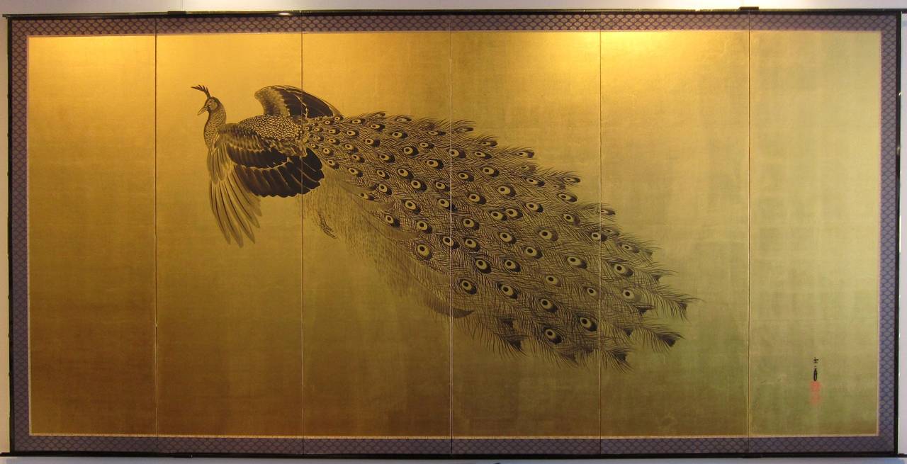 A pair of screens by Imao Keinen featuring peacocks painted in ink on gold leaf.  Lacquered wood frame, brocade border, incised copper hardware.

Dimensions: H 175cm x W 352cm

Biography of Imao Keinen (1845-1924).

Imao Keinen was born in Kyoto in
