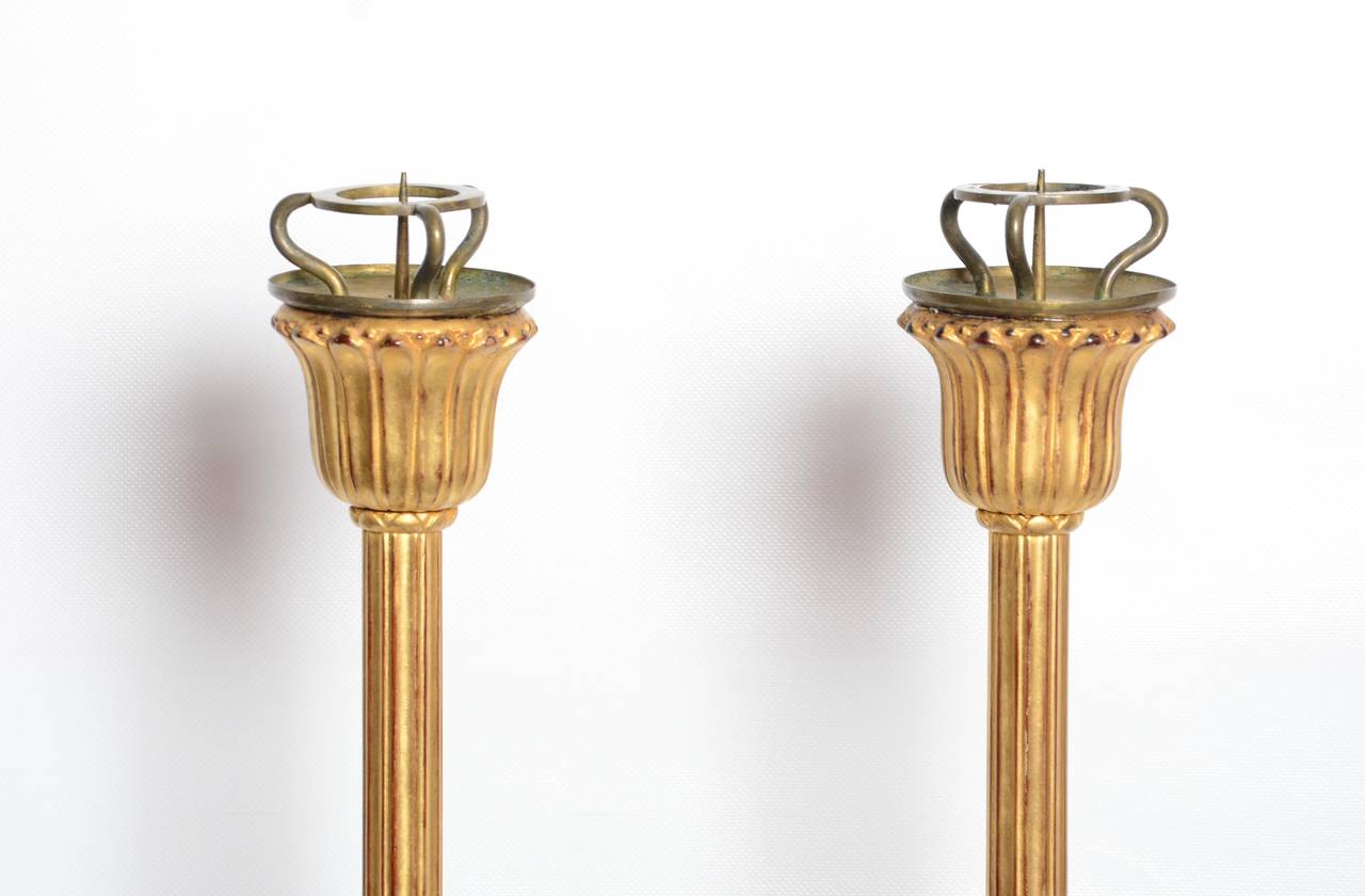 Pair of antique Japanese gilt candle stands with a carved chrysanthemum shaped base, Meiji period, circa 1900.

Materials: wood, gold.

Dimensions: H 64cm x D 14cm (each)