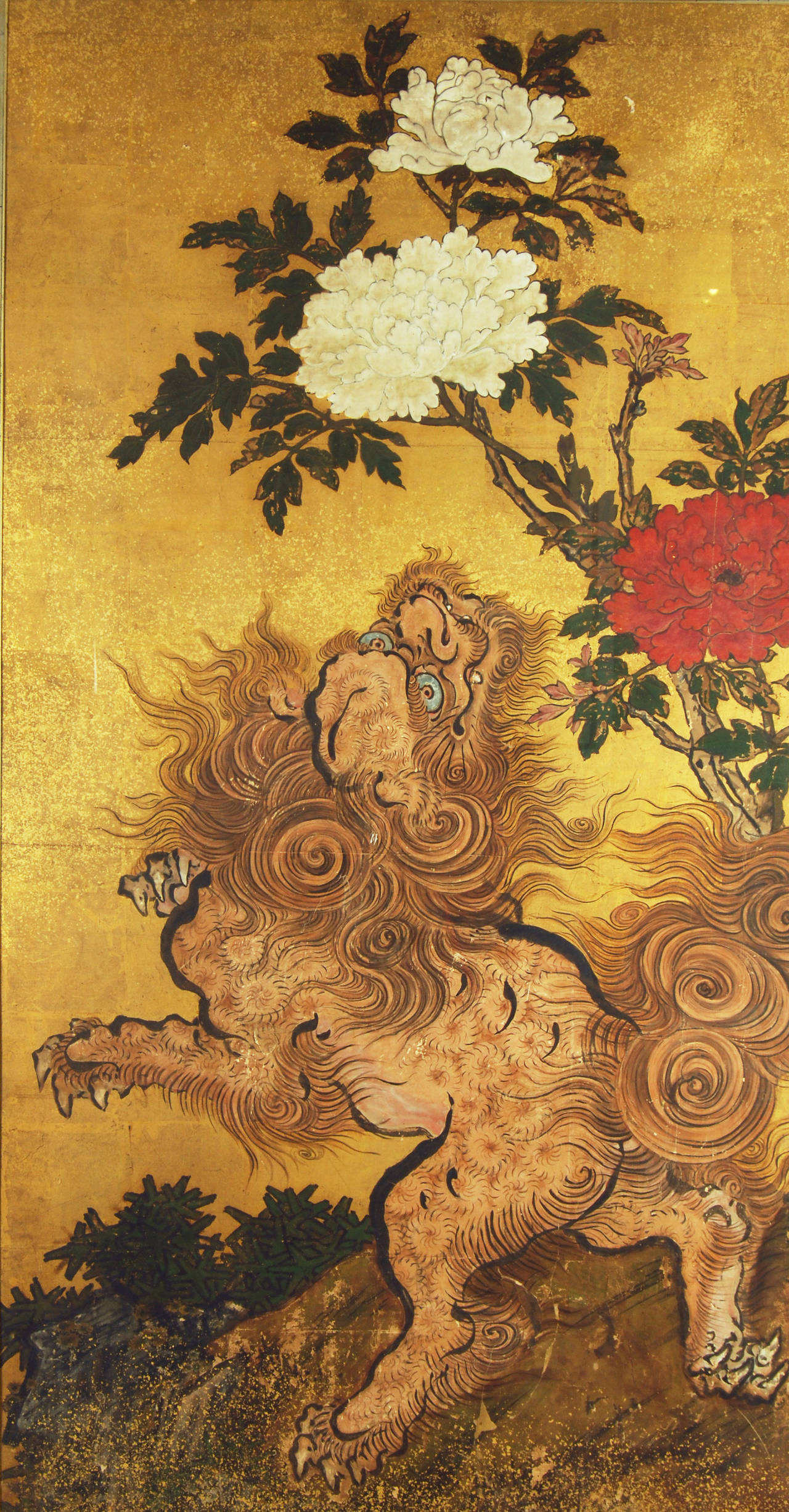 A rare pair of antique Japanese Karashishi paintings in a landscape of rocks and peony flowers on gold leaf ground in fine handmade frames, Edo period, early 18th century. The Karashishi (Chinese lion) and Komainu (Korean dog) are thought to have