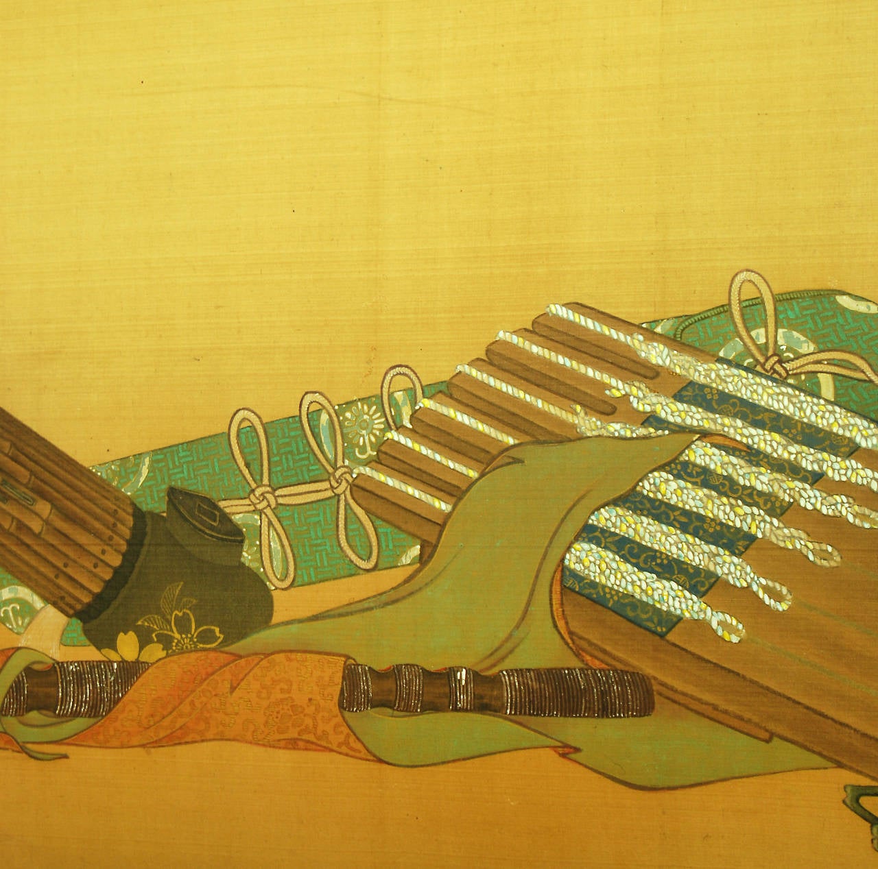 6 panel screen of unusual size depicting traditional musical instruments, flutes drum, koto and biwa painted on silk with a gold leaf surround. 

Dimensions:H 63cm x W 260cm 

As is the nature of Japanese screens this piece folds to a