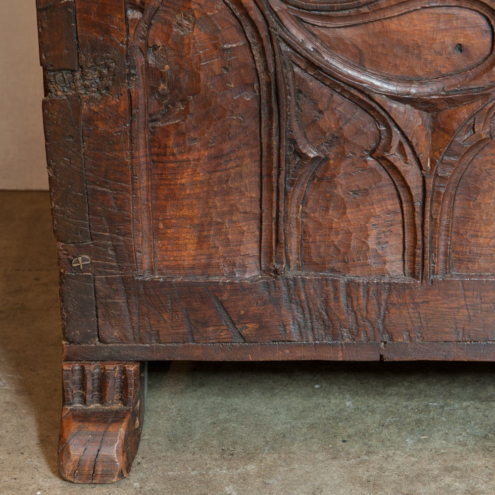 17th century French walnut trunk. The facade carved in low relief gothic astrigal designs, circa 1660.