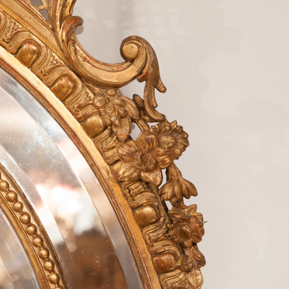 19th Century French Gilded Oval Framed Mirror, circa 1850 For Sale