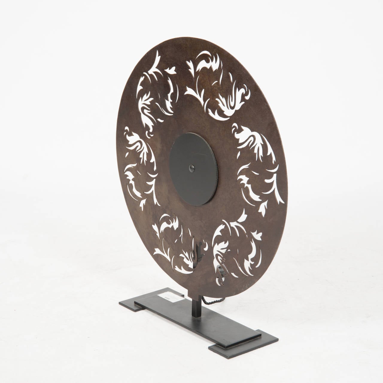 Metal Disc With Stencil Cutouts Now Made into a Lamp 

Height 610
Length 535 
Depth 130