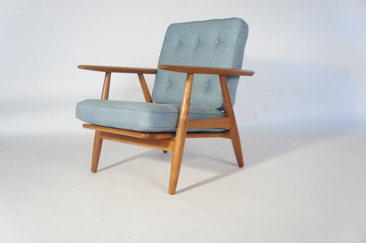 Hans Wegner 'Cigar' GE240 Chair Solid Oak by Getama, Denmark c.1950s.

Restored solid oak frame with new cushions and upholstery- Warwick Husk Amalfi.