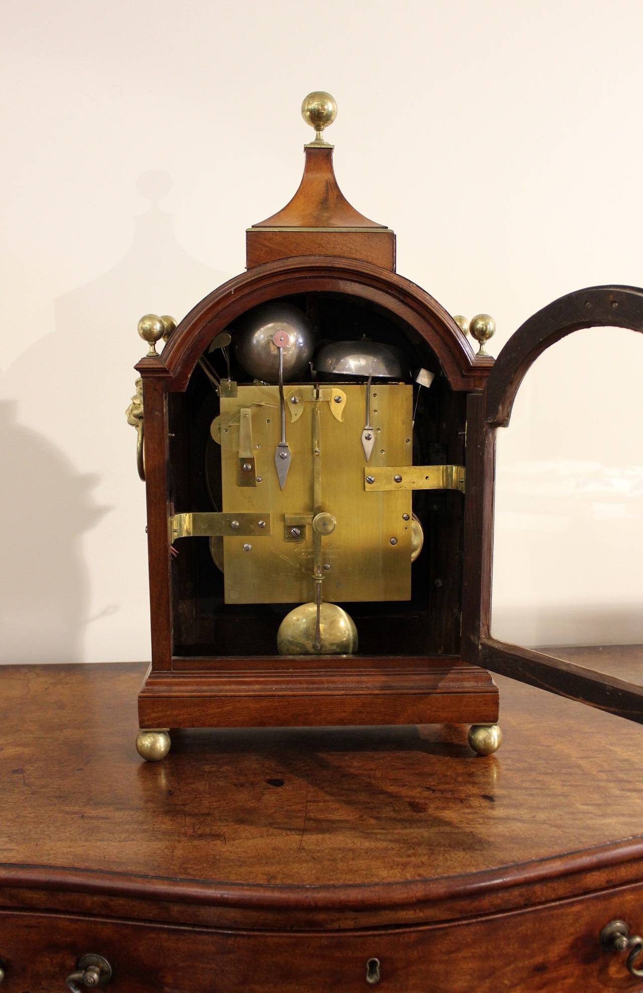 A Regency period mahogany and brass-mounted three-train, Bracket Clock, the 30cm circular silvered dial with Roman numerals and outer minute divisions, spade-hour hand and plain minute, signed 'Thwaites & Reed, Clerkenwell; the substantial movement