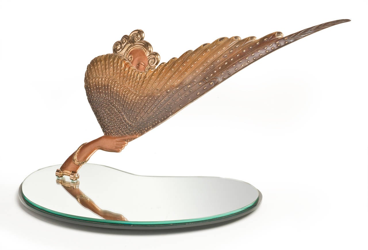 A signed decorative 20th century French bronze 'Coquette' sculpted limited edition bronze folding mirror.
Signed Erte (1892-1990).

Impressed, circa1985 R.K.Parker

#213/250.