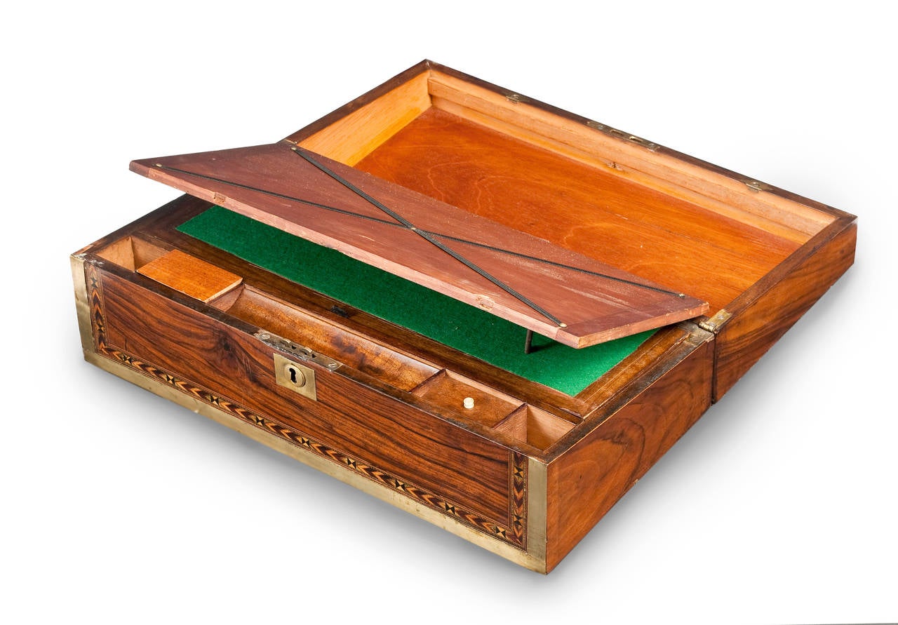 19th Century Anglo-Indian wild figured walnut writing box.
The top and front having cross banded brass work and framing the unusually deep turnbridge ware inlay.

Having the original lock and escutcheon.