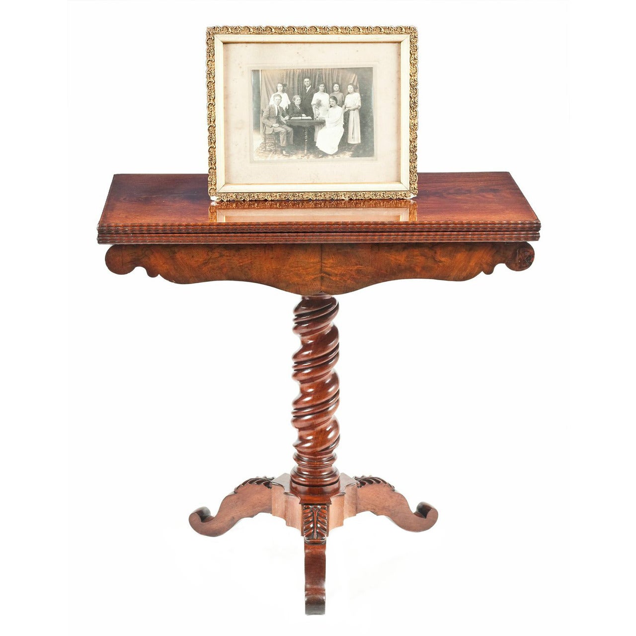 A late 19th Century French flame mahogany card table and family photo of. For Sale