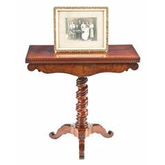 A late 19th Century French flame mahogany card table and family photo of.