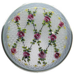 Solid silver and enamel round box with lattice of roses