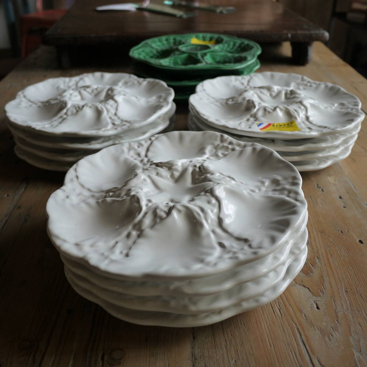Very summery set of white oyster plates, set of 12 available. Contact us if you wish to make a smaller set.